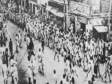 A Procession of Non-cooperators in Gandhi caps.jpg